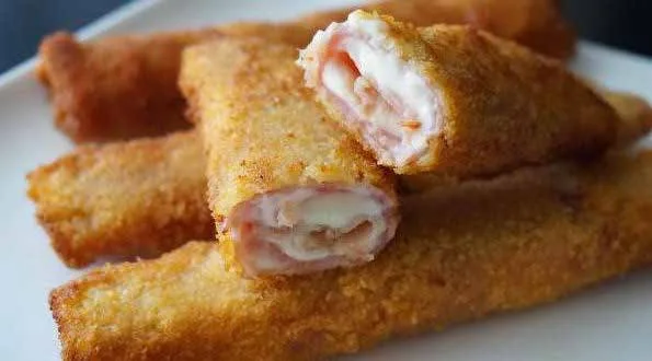 Roulés de blanc de poulet panés